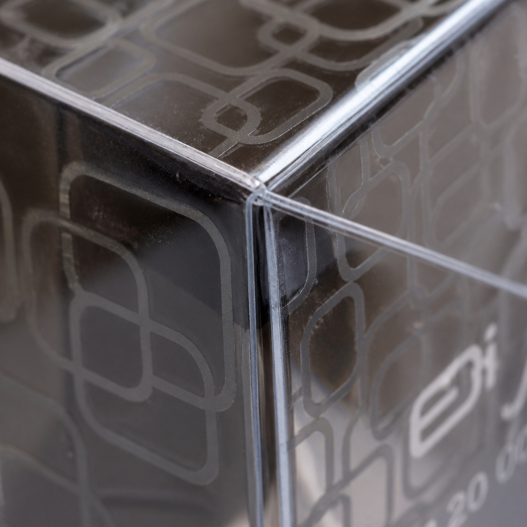die cut crease detail on transparent plastic box